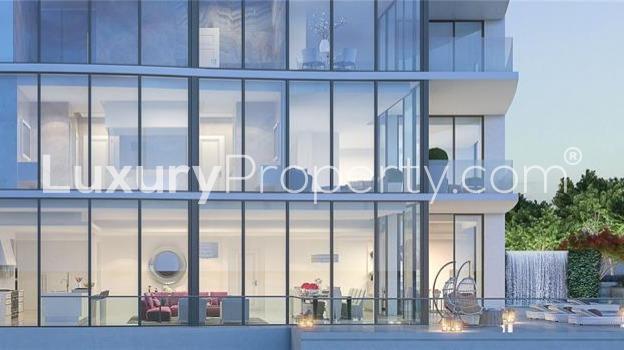 Furnished waterfront villa with glass facade in Sunny Isles Beach, Miami, for sale